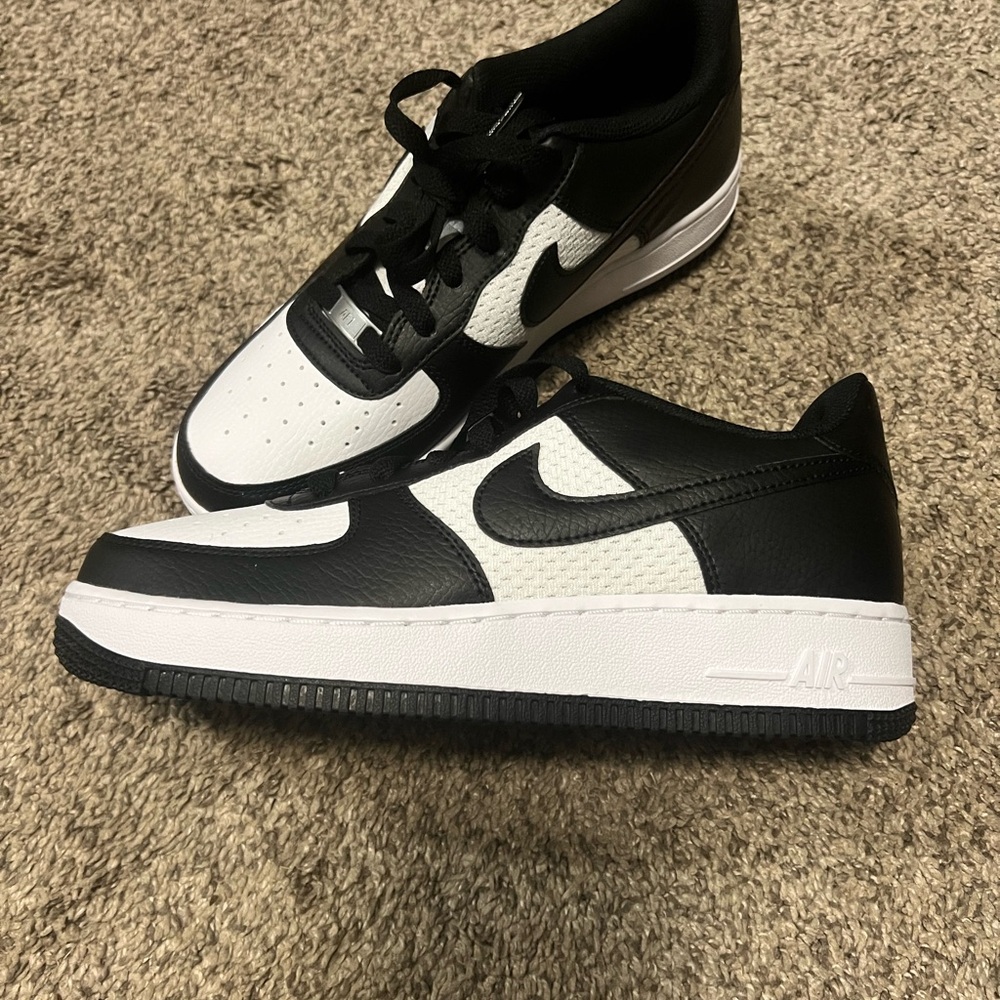 Kids Black and White Nike Sneakers